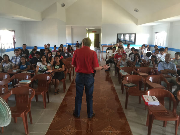 Larry West teaching students at NLBC (Northern Luzon Bible College)